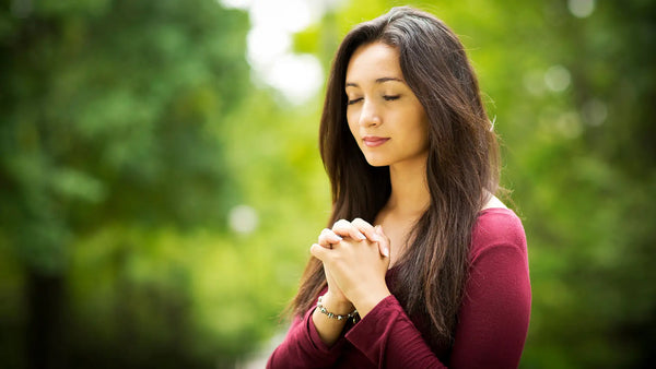 A Praying Woman Of God and Wearing Modern Christian Jewelry from Glor-e