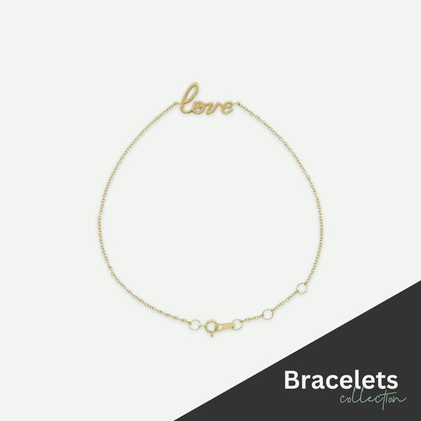 Yellow gold Christian Bracelet on an ivory background | Glor-e