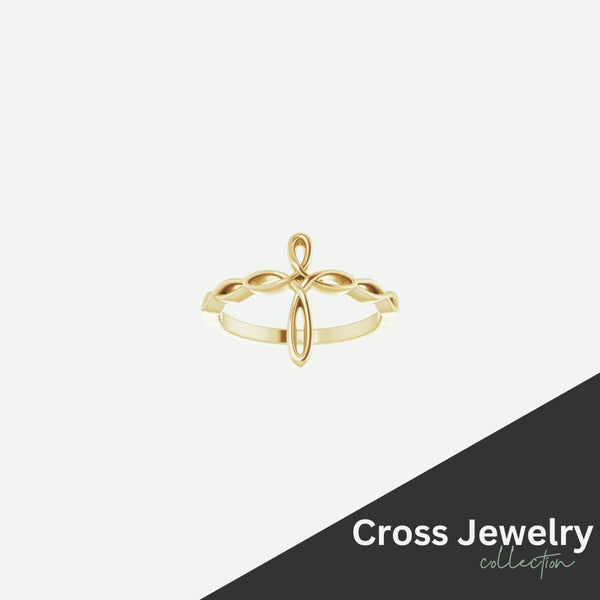 Yellow gold Christian cross ring – timeless symbol of faith on a studio ivory background