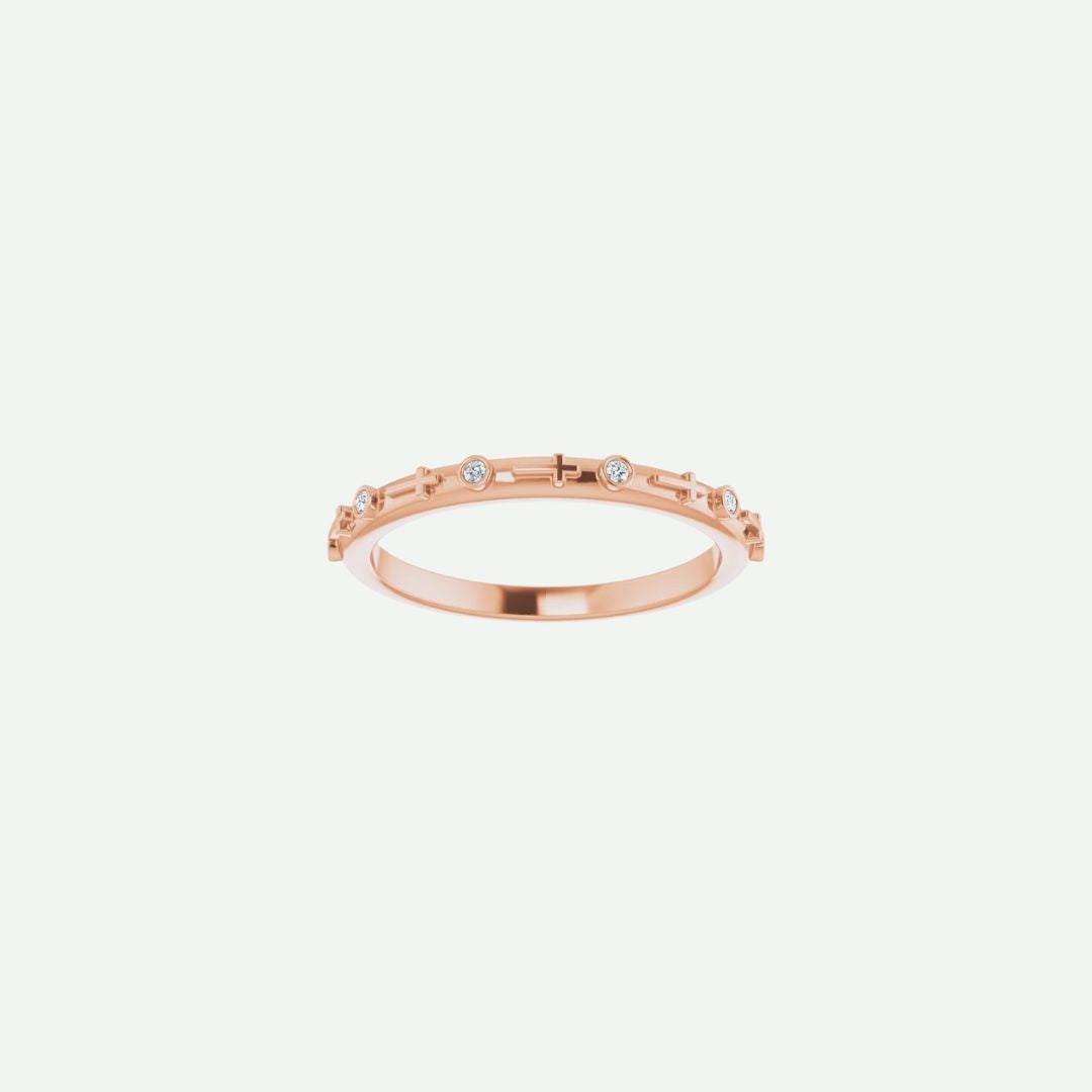 Front view of the GRACED rose gold ring, showcasing its delicate cross accent and graceful form.