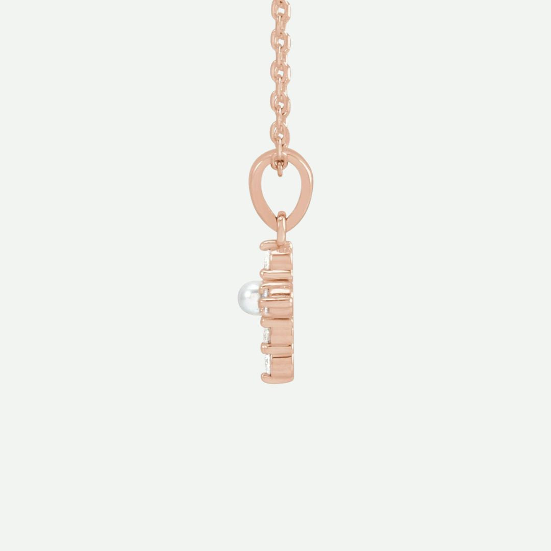 Side view of the GRACED rose gold pearl and diamond cross necklace, designed with soft elegance for timeless Christian style.