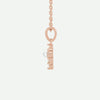 Side view of the GRACED rose gold pearl and diamond cross necklace, designed with soft elegance for timeless Christian style.