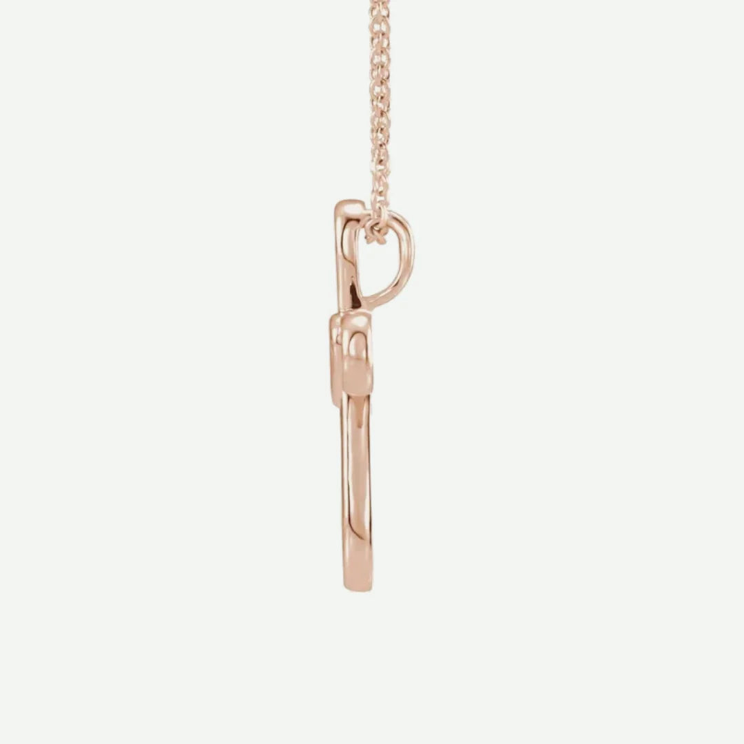 Side view of rose gold UNCONDITIONAL Christian necklace for women