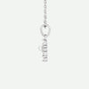 Side view of the GRACED sterling silver pearl and diamond cross necklace, highlighting its delicate design and devotion-filled meaning.