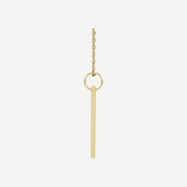 Side view of a 14K yellow gold engravable necklace with a simple pendant on a white background