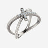 Oblique view of sterling silver diamond cross rope Christian ring for women