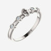 Oblique view of white gold .05 CTW Diamond Stackable Cross Christian Ring for women