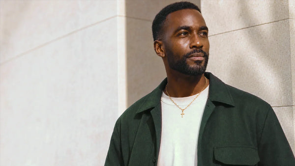 African American Man wearing a cross necklace from Glor-e