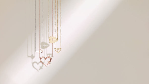 Christian Necklaces on an Tan Studio Background | Glor-e