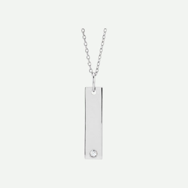 Front view of a sterling silver engravable necklace with a rectangular pendant on a white background