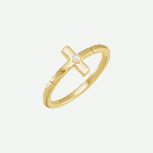 Front view of the PRECIOUS yellow gold cross ring with a delicate Akoya pearl accent, blending elegance with devotion.