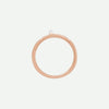 Top view of the PRECIOUS sideways cross ring in rose gold with a white Akoya pearl, a graceful reminder of faith’s priceless beauty.