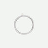 Top view of the PRECIOUS sideways cross ring in sterling silver, accented by a white Akoya pearl as a symbol of purity and faith.