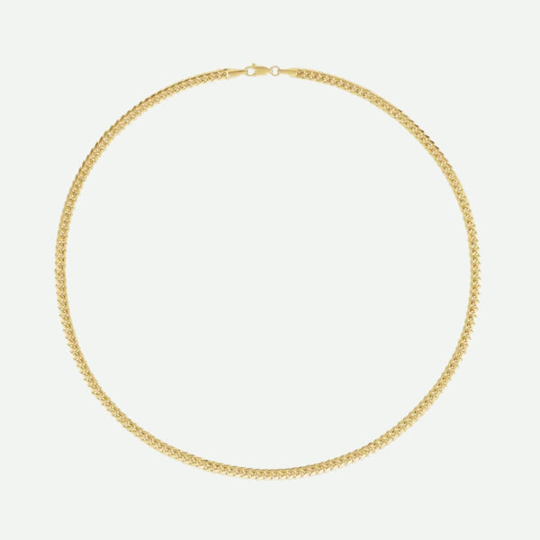Top View of Yellow GOLD MIAMI CUBAN chain for men on a white background