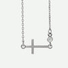Front view of white gold Sideways Cross Christian necklace for women