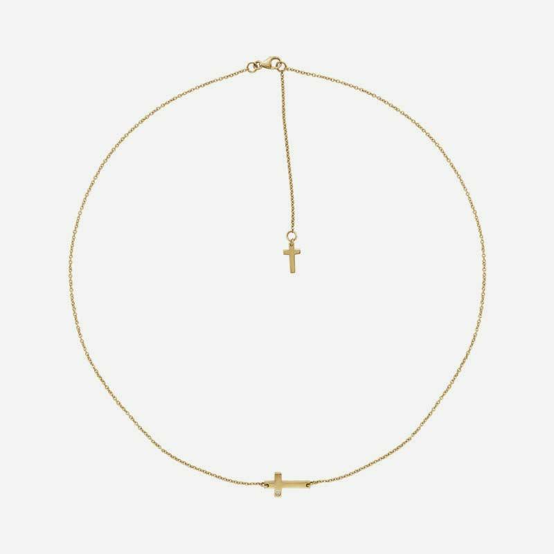 Top view of yellow gold Sideways Cross Christian necklace for women