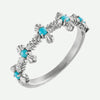 Oblique view of white gold Turquoise Cross Christian Ring For Women