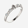 Oblique view of sterling silver .05 CTW Diamond Stackable Cross Christian Ring for women