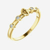 Oblique view of yellow gold .05 CTW Diamond Stackable Cross Christian Ring for women